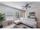 Comfortable living room with neutral tones, a sectional sofa, and ample natural light from the windows at 8643 Coventry Park Way, Windermere, FL 34786