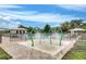 Community splash pad with fountains and play structures next to the pool and clubhouse at 8643 Coventry Park Way, Windermere, FL 34786