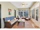 Enclosed lanai with brick floors, ample seating, and lots of natural light at 89 Pine Forest Ln, Haines City, FL 33844