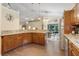 Spacious kitchen featuring granite countertops, ample cabinet space, and stainless steel appliances at 89 Pine Forest Ln, Haines City, FL 33844