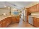 Spacious kitchen with granite countertops, stainless steel appliances, and ample cabinet space at 89 Pine Forest Ln, Haines City, FL 33844