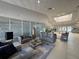 Inviting lobby featuring comfortable seating, large windows, and modern decor in a communal area at 3045 Yellow Lantana Ln, Kissimmee, FL 34747