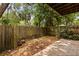 Backyard featuring a wood fence and concrete slab at 503 Moree Loop, Winter Springs, FL 32708