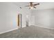 Spacious bedroom with neutral carpet and multiple closets at 503 Moree Loop, Winter Springs, FL 32708