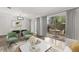 Inviting living area with dining space and sliding glass doors to outdoor patio at 503 Moree Loop, Winter Springs, FL 32708