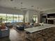 A community clubhouse with large windows overlooking the pool at 5421 Watervista Dr, Orlando, FL 32821