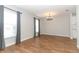 Bright dining room with windows and hardwood-style flooring at 7584 Lodge Pole Trl, Winter Park, FL 32792