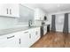 Bright kitchen featuring stainless steel appliances and granite countertops at 7584 Lodge Pole Trl, Winter Park, FL 32792