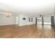 Spacious living room with access to a screened patio and pool view at 7584 Lodge Pole Trl, Winter Park, FL 32792