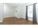 Inviting living room with wood floors and bright natural light at 7584 Lodge Pole Trl, Winter Park, FL 32792