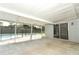 Covered patio provides relaxing outdoor space, overlooking the pool at 7584 Lodge Pole Trl, Winter Park, FL 32792