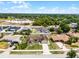 Aerial view of the home showcases its well-maintained lawn and appealing curb appeal at 1132 Feather Dr, Deltona, FL 32725