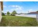 Partially fenced backyard ideal for Gathering gatherings and pets at 1132 Feather Dr, Deltona, FL 32725