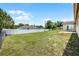 Large backyard offers ample space for recreation and includes a patio with seating at 1132 Feather Dr, Deltona, FL 32725