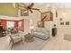 Spacious living room with high ceilings, fan, tile floors, and open to the dining area at 1532 Lawndale Cir, Winter Park, FL 32792