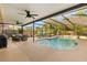 Enclosed pool area featuring comfortable seating, perfect for relaxation at 1532 Lawndale Cir, Winter Park, FL 32792