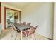 Cozy patio area with a dining table, perfect for outdoor meals and relaxation at 1571 Plunker Dr, Davenport, FL 33896