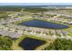 A Primary-planned community with homes surrounding large ponds and preserved green spaces at 6137 Blue Pond Way, St Cloud, FL 34771