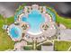 Stunning aerial view of resort-style community pool with multiple pools, lounge chairs and umbrellas at 6137 Blue Pond Way, St Cloud, FL 34771