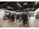 Spacious gym with high ceilings featuring fitness equipment, machines and fans for a complete workout at 6137 Blue Pond Way, St Cloud, FL 34771