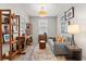 Stylish living room with well-chosen decor elements and a comfortable seating area at 6137 Blue Pond Way, St Cloud, FL 34771