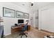 Inviting home office with a sleek desk, ergonomic chair, and tasteful wall art at 6137 Blue Pond Way, St Cloud, FL 34771