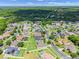 This aerial view highlights the property's location within a neighborhood with mature trees and green spaces at 972 Bighorn St, Oviedo, FL 32765