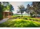 Scenic gazebo overlooking a serene lake, perfect for relaxation and enjoying nature at 972 Bighorn St, Oviedo, FL 32765