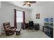 Functional home office featuring a comfortable chair, desk, and ample workspace at 972 Bighorn St, Oviedo, FL 32765