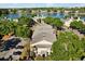 Beautiful aerial view of a community on the water surrounded by trees and parking at 1063 S Hiawassee Rd # 1615, Orlando, FL 32835