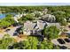 Great aerial shot of the property featuring lush landscaping, and nearby parking at 1063 S Hiawassee Rd # 1615, Orlando, FL 32835