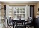 Comfortable dining area with a large window providing natural light at 1063 S Hiawassee Rd # 1615, Orlando, FL 32835
