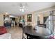 Open-concept living and dining area, complete with sliding glass doors to the outside at 1063 S Hiawassee Rd # 1615, Orlando, FL 32835