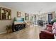 Inviting living room with tile flooring, ceiling fan, and sliding glass doors to outdoor area at 1063 S Hiawassee Rd # 1615, Orlando, FL 32835