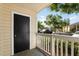 Charming patio area with a view of the street and lush greenery at 1063 S Hiawassee Rd # 1615, Orlando, FL 32835