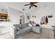 Comfortable living room with tile floors and a neutral-colored sectional couch at 1065 S Hiawassee Rd # 1436, Orlando, FL 32835