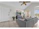 Cozy living room with comfortable seating, natural light, and neutral color palette at 1065 S Hiawassee Rd # 1436, Orlando, FL 32835