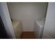 Utility closet featuring a stacked washer and dryer at 1075 S Hiawassee Rd # 916, Orlando, FL 32835