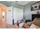 A bedroom leading into another room, partially filled with boxes and personal belongings at 1350 Royal St George Blvd, Davenport, FL 33896