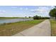 Scenic walking path by the lake offering beautiful views and a peaceful environment at 1350 Royal St George Blvd, Davenport, FL 33896