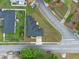 An aerial view of a home featuring modern architecture and clean landscaping at 1440 Lake Shore Dr, Casselberry, FL 32707