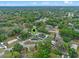 Aerial view showing a home with a lush green environment and accessible roads at 1440 Lake Shore Dr, Casselberry, FL 32707