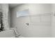 Laundry room with hook ups, storage shelf, and window for natural light at 1440 Lake Shore Dr, Casselberry, FL 32707