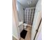 Full bathroom featuring neutral tile flooring, modern vanity and shower with decorative curtain at 14796 Sw 39Th Cir, Ocala, FL 34473