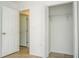 Bright bedroom featuring tile flooring, a closet, and neutral walls at 14796 Sw 39Th Cir, Ocala, FL 34473