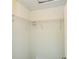 Walk-in closet with white wire shelving for efficient storage at 14796 Sw 39Th Cir, Ocala, FL 34473
