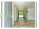 Spacious living room with tile flooring, sliding glass doors and an abundance of natural light at 14796 Sw 39Th Cir, Ocala, FL 34473