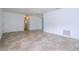 Bright, open living room with tile floors, and a view of the hallway at 14796 Sw 39Th Cir, Ocala, FL 34473