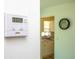 Wall thermostat with digital display to regulate temperature at 14796 Sw 39Th Cir, Ocala, FL 34473