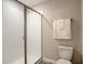 Contemporary bathroom features a glass-enclosed shower and modern fixtures and towel rack at 1491 Rolling Fairway Dr, Davenport, FL 33896
